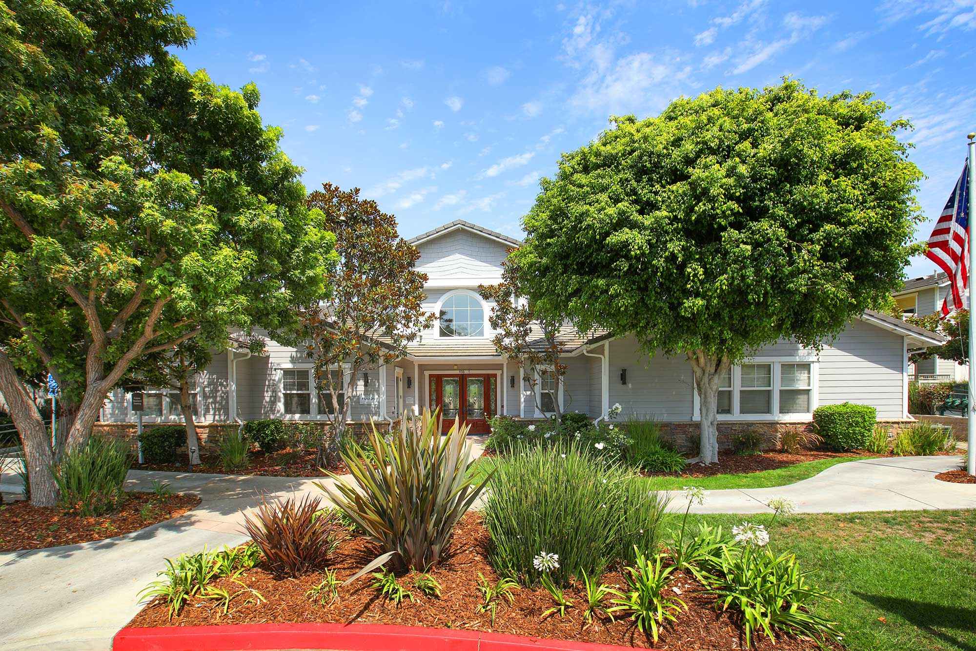leasing office exterior with manicured landscaping at Via Ventura