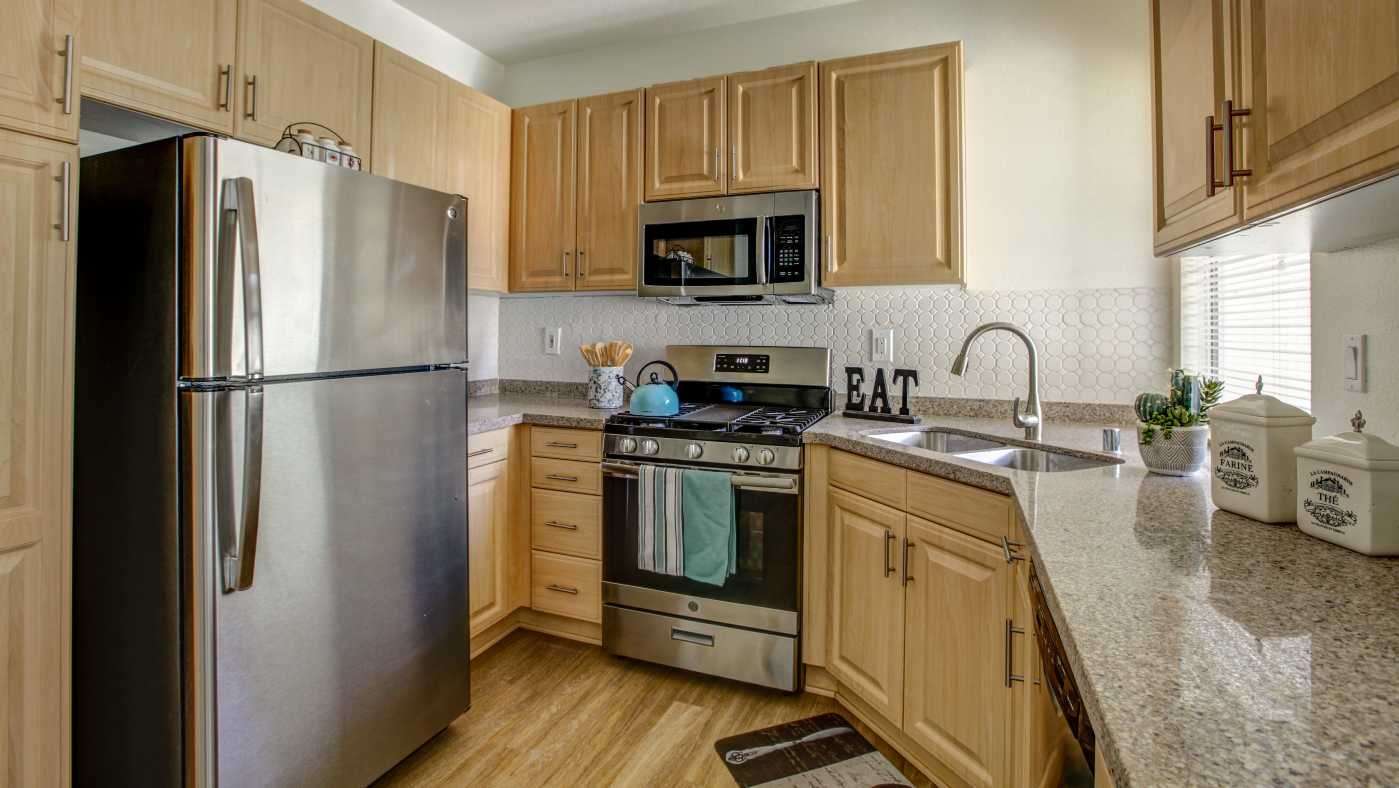 Renovated kitchen with granite countertops