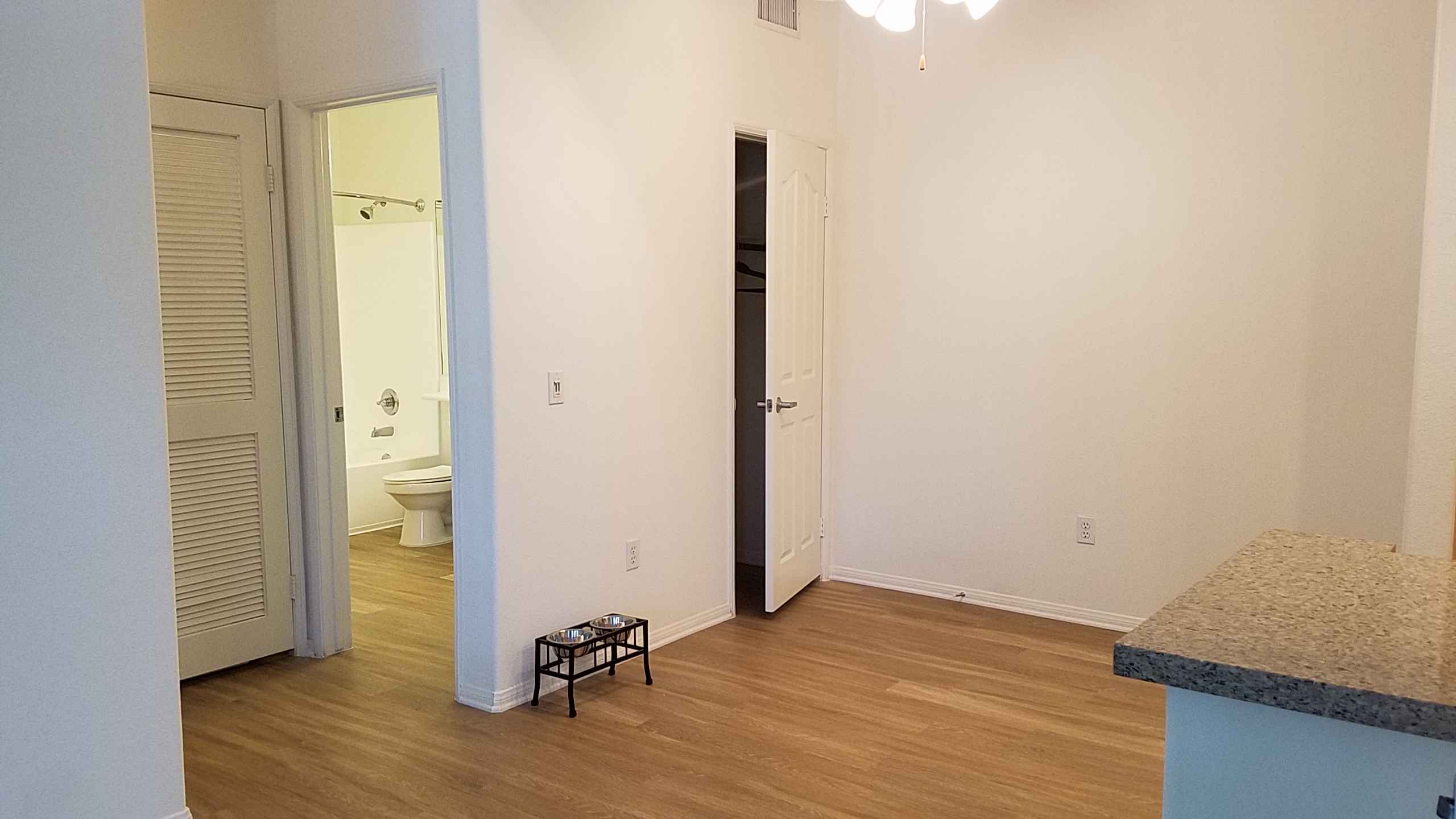apartment interior view to bathroom and closet at Via Ventura